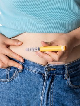 A,Woman,Injecting,Herself,With,Obesity,Medication A,Woman,Injecting,Herself,With,Obesity,Medication